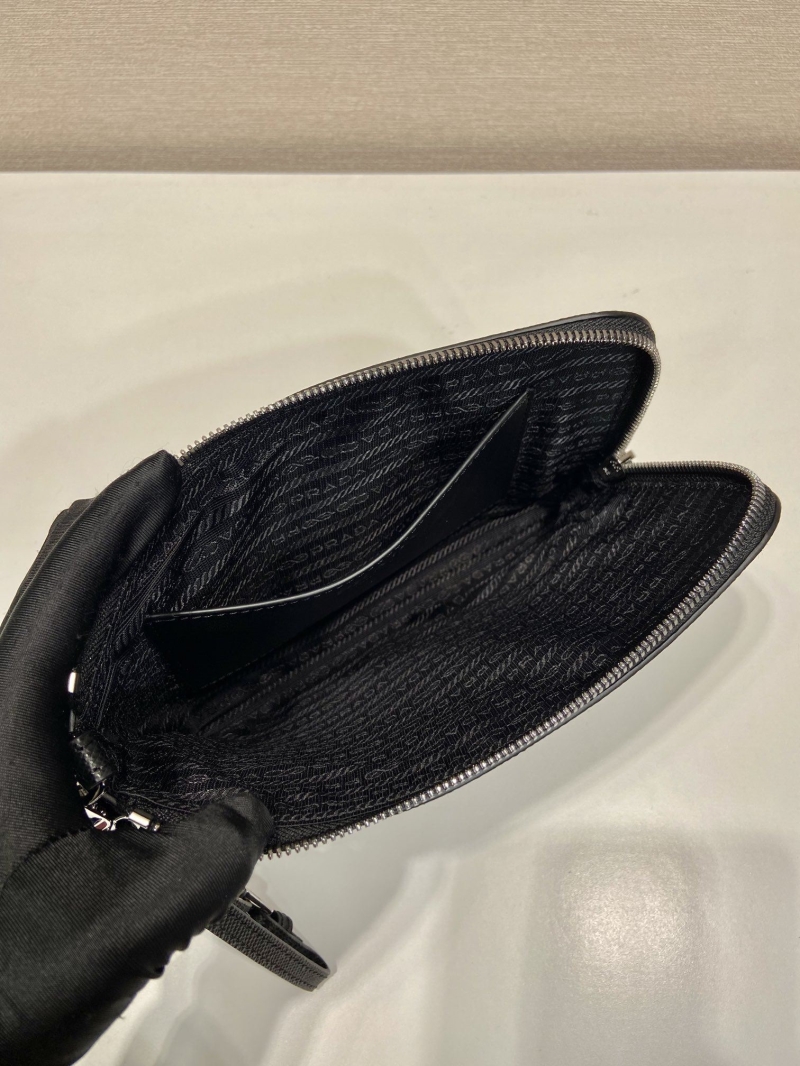Pra*a clutch bags